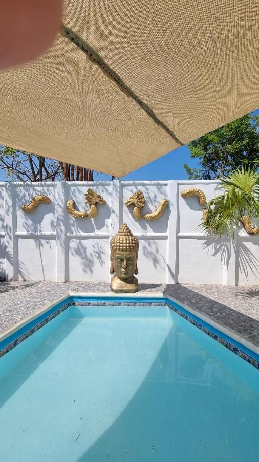 Casa Buddha Chelem Bagian luar foto